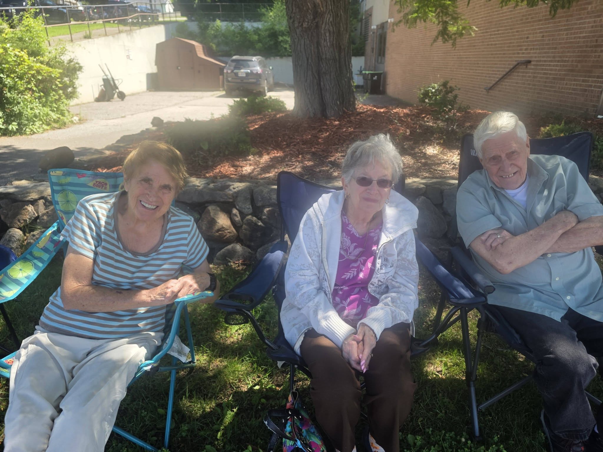 Three Family Ties Participants enjoying an outdoor concert.